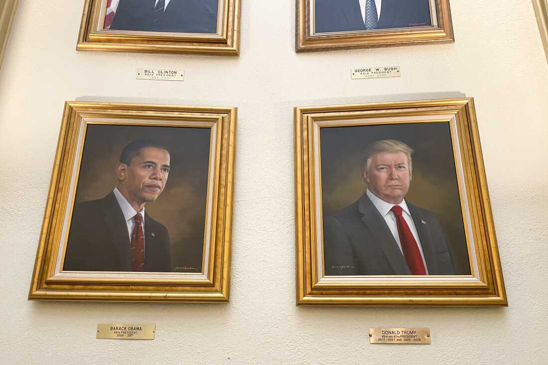 Portraits of President Donald Trump and former President Barack Obama, painted by artist Sarah Boardman, hang in the Capitol Rotunda in Denver last month. The Trump portrait has since been taken down.
