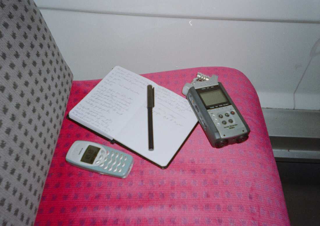 Lamm's journalism kit includes a dictaphone she uses to conduct interviews and record music demos, her dumbphone, and a notebook that she says she would be "lost without."