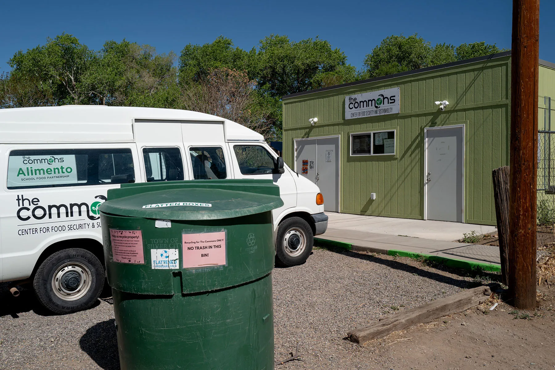 A van is parked outside a community food bank.